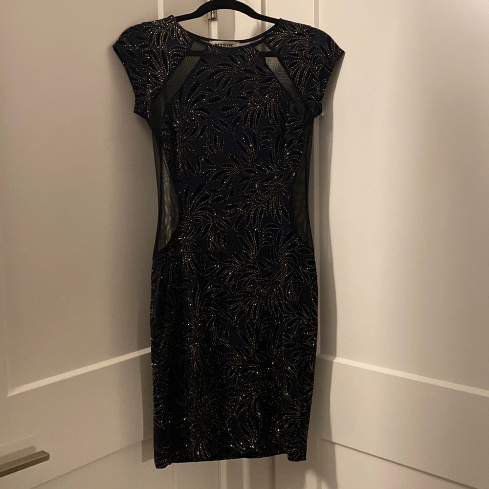 Hello I am selling a blue with gold dress size small.